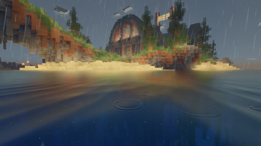 Rain rings on a still bay with the town reflected